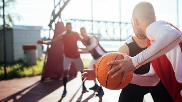 Men Playing Basketball Men Playing Basketball